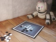 Robot Aibo jouant au jeu Othello Robot Aibo jouant au jeu Othello